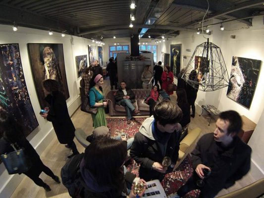 Guests viewing art at an exhibition